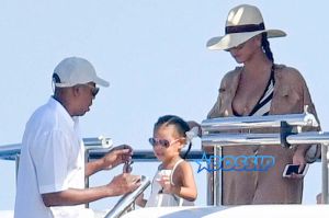 Blue Ivy Carter Jay Z Beyonce yacht Capri Italy sunglasses swimsuit coverup AKM-GSI