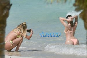 AKM-GSI FameFlynetPictures Kylie Jenner Beach Photo shoot peach bikini