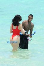 AKM-GSI FameFlynetPictures Kylie Jenner Beach Tyga Red Thong One Piece Swimsuit