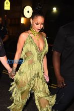 AKM-GSI Rihanna Drake Up and Down after MTV Video Music Awards where she won the Video Vanguard award green fringe jumpsuit
