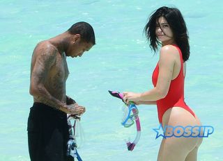 AKM-GSI FameFlynetPictures Kylie Jenner Beach Tyga Red Thong One Piece Swimsuit
