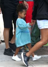FameFlynetPictures 52166483 Kim Kardashian and Kanye West's children North and Saint West are seen leaving their apartment with their nanny in New York City, New York on September 7, 2016.