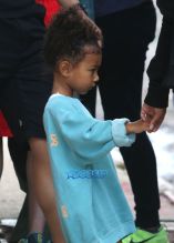 FameFlynetPictures 52166483 Kim Kardashian and Kanye West's children North and Saint West are seen leaving their apartment with their nanny in New York City, New York on September 7, 2016.