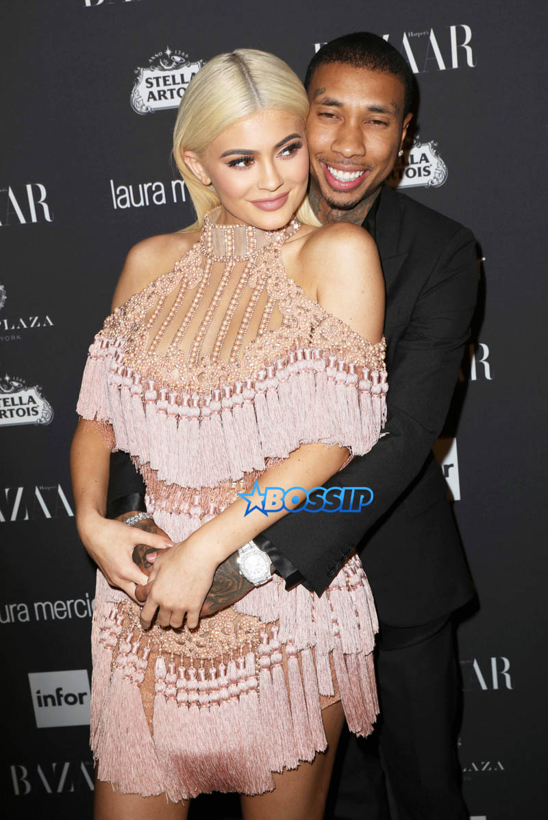 Kylie Jenner Tyga pink dress blonde hair happy coupled up Harper's Bazaar Celebrates "ICONS By Carine Roitfeld" at The Plaza Hotel in New York City. SplashNews