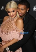 Kylie Jenner Tyga pink dress blonde hair happy coupled up Harper's Bazaar Celebrates "ICONS By Carine Roitfeld" at The Plaza Hotel in New York City. SplashNews