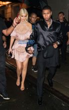Kylie Jenner Tyga pink dress blonde hair happy coupled up Harper's Bazaar Celebrates "ICONS By Carine Roitfeld" at The Plaza Hotel in New York City. SplashNews