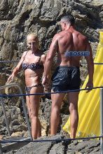 AKM-GSI Donatella Versace Portofino Italy male friend bikini beach