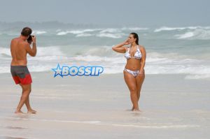 AKM-GSI Ashley Graham, world's hottest women, curves Cancun, Mexico bikini body patterned two-piece.