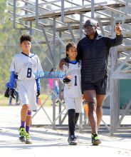 Singer Seal boys Henry and Johan football game Brentwood, California on October 15, 2016. FameFlynet