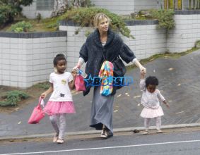 Actress Charlize Theron two kids Jackson Theron and August Theron birthday party in Beverly Hills, California on October 30, 2016. pink tutus ballerinas in light of Halloween. Jackson long blonde hair pinned to his hair. FameFlynet,