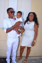 Rihanna Barbados. christening of cousin Nikolai. 11am to the Power In the Blood Assembly bestie Melissa baby blue dress and long dreadlocks. Majesty in her lap. baby's mother Nicolette, grandmother Marcel, cousin Noella altar Nikolai's dedication. SplashNews