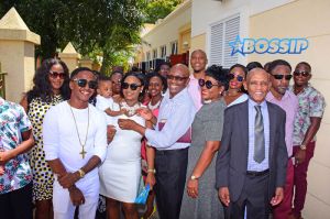 Rihanna Barbados. christening of cousin Nikolai. 11am to the Power In the Blood Assembly bestie Melissa baby blue dress and long dreadlocks. Majesty in her lap. baby's mother Nicolette, grandmother Marcel, cousin Noella altar Nikolai's dedication. SplashNews
