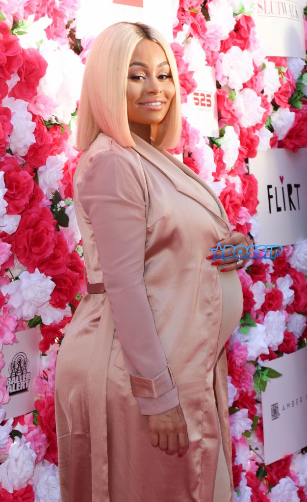 Blac Chyna shows off her baby bump on the pink carpet at the Amber Rose Slutwalk in Los Angeles, CA Pictured: Blac Chyna Ref: SPL1366537 011016 Picture by: London Entertainment/Splash News Splash News and Pictures Los Angeles:310-821-2666 New York:212-619-2666 London:870-934-2666 photodesk@splashnews.com 