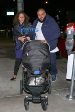 DJ Khaled fiancée Nicole Tuck newborn son Asahd Tuck Khaled to Catch LA in West Hollywood. The couple welcomed baby Asahd just under a month ago. blue track suit, stroller AKM-GSI