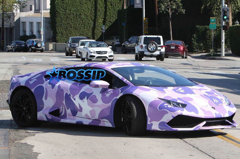 Which Popular Rapper Rides In This Purple Lamborghini