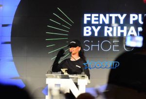 SplashNews Rihanna Wears Huge Diamond Necklace and Emerald Earrings to Footwear News Achievement Awards in NYC.