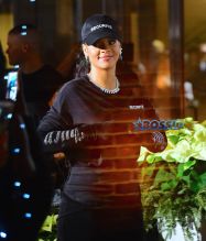 Rihanna Wears Huge Diamond Necklace and Emerald Earrings to Footwear News Achievement Awards in NYC. Splashnews