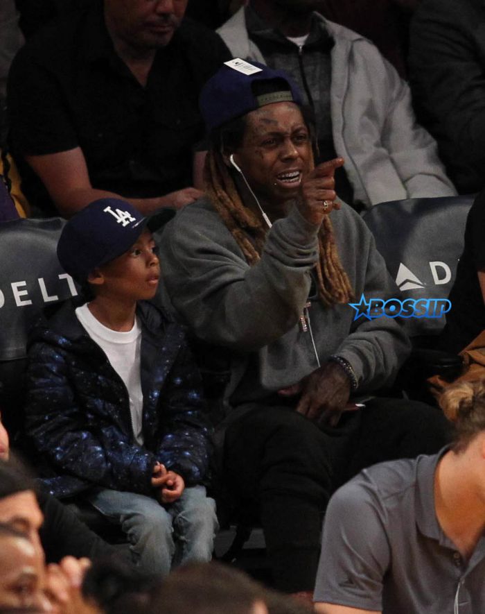 Lil' Wayne spotted in the audience at the Lakers game held at the Staples Center in Los Angeles, CA, USA. The Lakers won the game with 125 and Nets-118. Pictured: Lil' Wayne Ref: SPL1389132 151116 Picture by: London Ent / Splash News Splash News and Pictures Los Angeles:310-821-2666 New York:212-619-2666 London:870-934-2666 photodesk@splashnews.com 