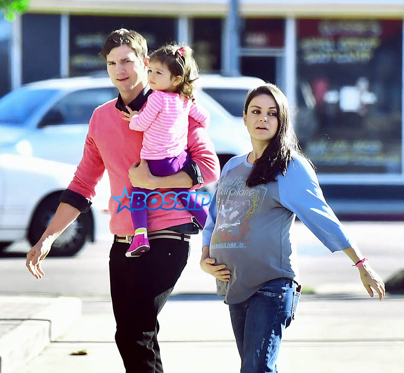 SplashNews A very pregnant Mila Kunis along with husband Ashton Kutcher were spotted heading to breakfast with daughter Wyatt in Studio City, CA. 