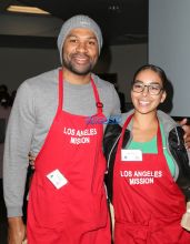 Derek Fisher Gloria Govan Los Angeles Mission Christmas Celebration For the Homeless WENN