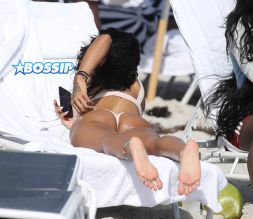 Chris Brown's ex Karrueche Tran pale pink bikini, Miami. SplashNews