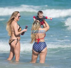 Coco Austin red white blue polka dot bikini body beach Miami baby Chanel on vacation with husband Ice T SplashNews