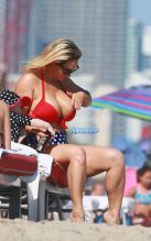 Coco Austin red white blue polka dot bikini body beach Miami baby Chanel on vacation with husband Ice T SplashNews