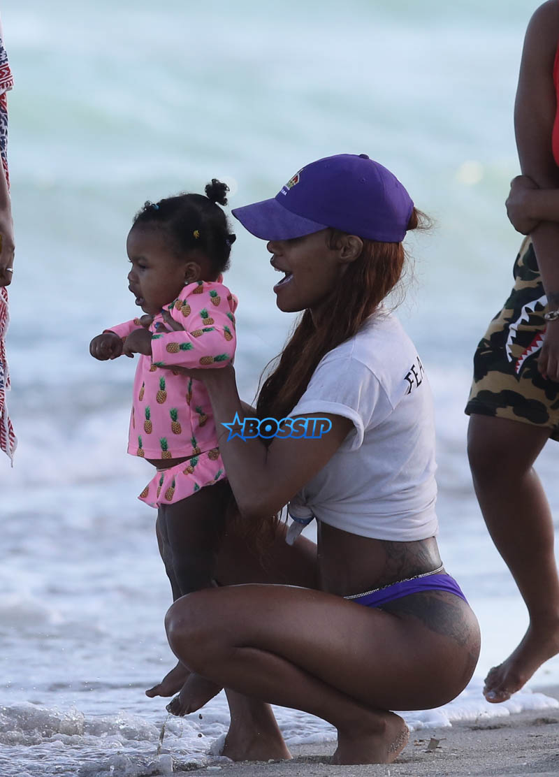 Teyana Taylor purple thong beach vacation in Miami. Baby Junie aka Iman Tayla Shumpert  SplashNews