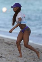 Teyana Taylor beach vacation in Miami. Baby Junie aka Iman Tayla Shumpert SplashNews