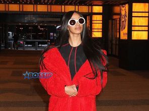 'Love and Hip Hop: New York' star Cardi B MTV Studios VFILES wearing a red fur coat and a black and red bodysuit