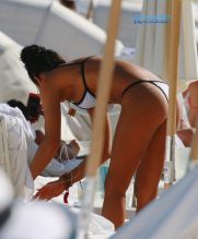 Singer Cassie Ventura s bikini body black and white swimsuit at the beach in Miami, Florida. SplashNews