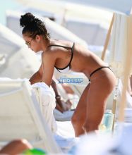 Singer Cassie Ventura s bikini body black and white swimsuit at the beach in Miami, Florida. SplashNews