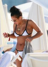 Singer Cassie Ventura s bikini body black and white swimsuit at the beach in Miami, Florida. SplashNews