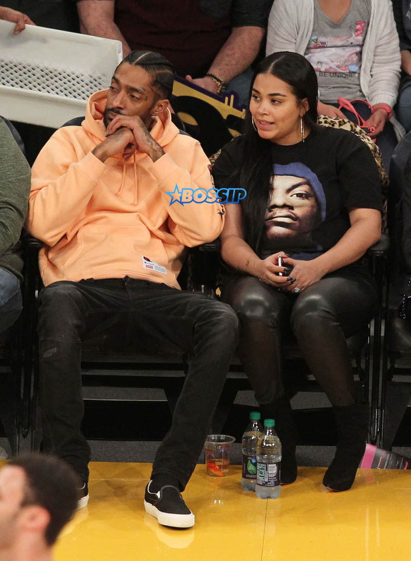 Nipsey Hussle and Lauren London seen out at the Lakers vs. Spurs game at the Staples Center in Los Angeles, California. SplashNews