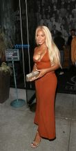 Christina Millian has new Blond bombshell look and reveals a little too much at Catch in West hollywood. SplashNews