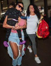Chris Brown's Mother, Joyce Hawkins, and his Baby Mama, Nia Guzman seen with daughter Royalty at LAX airport in Los Angeles, California. SplashNews