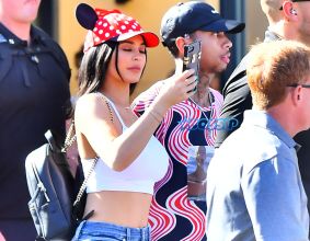 Kylie enjoys a churro while out at Disneyland with her boyfriend Tyga and his son King Cairo Photos.March 8, 2017. SplashNews
