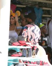 Kylie Jenner & Tyga are seen riding roller coasters and trying on Mickey ears at Disneyland in California. SplashNews