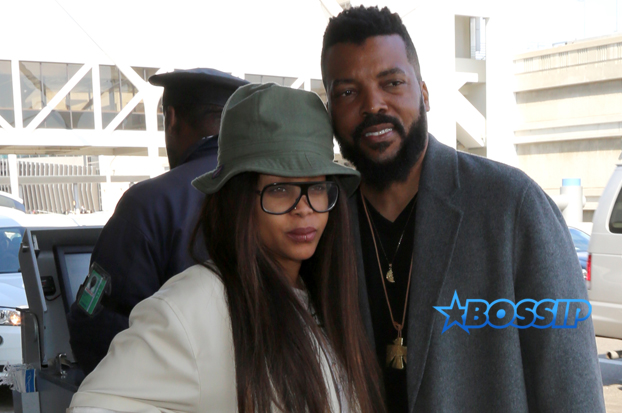 Erykah Badu Carl Jones JFK following Coachella SplashNews