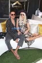 APRIL 15: Evan Ross and Ashley Simpson celebrate A Toast to Summer with the NEW Limited Edition CIROC Summer Colada at the Hard Rock Hotel in Palm Springs on April 15, 2017 in Palm Springs, California. (Photo by Joe Scarnici/WireImage)