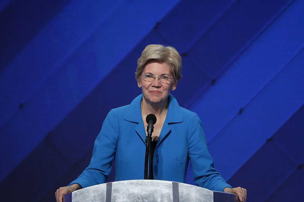 PHILADELPHIA, PA - JULY 28: Sen. Elizabeth Warren (D-MA) delivers remarks on the fourth day of the Democratic National Convention at the Wells Fargo Center, July 28, 2016 in Philadelphia, Pennsylvania. Democratic presidential candidate Hillary Clinton received the number of votes needed to secure the party's nomination. An estimated 50,000 people are expected in Philadelphia, including hundreds of protesters and members of the media. The four-day Democratic National Convention kicked off July 25. (Photo by Alex Wong/Getty Images)