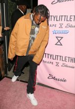 Travis Scott attends the PrettyLittleThing campaign launch for PLT SHAPE with brand ambassador Anastasia Karanikolaou on April 11, 2017 in Los Angeles, California. (Photo by JB Lacroix/WireImage)