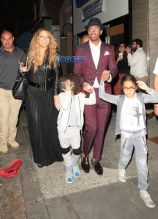 Mariah Carey Ex Husband Nick Cannon and their twin children for dinner at Mr. Chow Restaurant followed by frozen Yogurt at 'Pinkberry' in Beverly Hills, CA. Mariah wardrobe malfunction dress see-thru. Nick Maroon colored suit and a hat. SplashNews