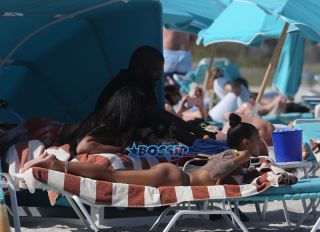 15 APRIL 2017 Karrueche Tran enjoys relaxing on the beach with her friends in a tan bikini. The actress leafs through a script titled "Claws" and seems to be a TV script as it also indicates it has episodes. The script is directed by 'Mozart in the Jungle' director Tricia Brock and written by Leila Gerstein who has written scripts for 'Gossip Girl' 'The OC' and 'Hart of Dixie'. Pictured: Karrueche Tran OHPIX/SplashNews