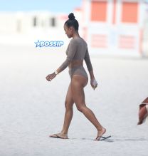 15 APRIL 2017 Karrueche Tran enjoys relaxing on the beach with her friends in a tan bikini. The actress leafs through a script titled "Claws" and seems to be a TV script as it also indicates it has episodes. The script is directed by 'Mozart in the Jungle' director Tricia Brock and written by Leila Gerstein who has written scripts for 'Gossip Girl' 'The OC' and 'Hart of Dixie'. Pictured: Karrueche Tran OHPIX/SplashNews