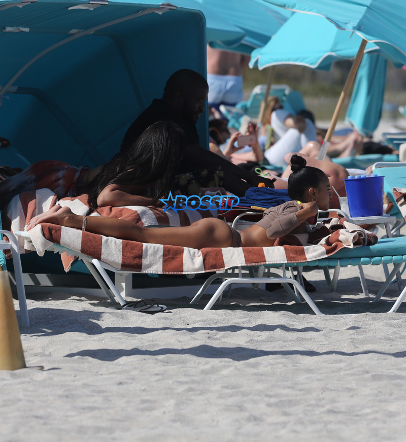 15 APRIL 2017 Karrueche Tran enjoys relaxing on the beach with her friends in a tan bikini. The actress leafs through a script titled "Claws" and seems to be a TV script as it also indicates it has episodes. The script is directed by 'Mozart in the Jungle' director Tricia Brock and written by Leila Gerstein who has written scripts for 'Gossip Girl' 'The OC' and 'Hart of Dixie'. Pictured: Karrueche Tran OHPIX/SplashNews