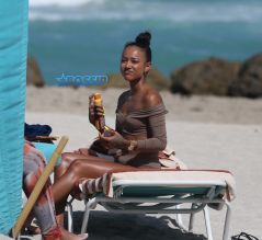 15 APRIL 2017 Karrueche Tran enjoys relaxing on the beach with her friends in a tan bikini. The actress leafs through a script titled "Claws" and seems to be a TV script as it also indicates it has episodes. The script is directed by 'Mozart in the Jungle' director Tricia Brock and written by Leila Gerstein who has written scripts for 'Gossip Girl' 'The OC' and 'Hart of Dixie'. Pictured: Karrueche Tran OHPIX/SplashNews
