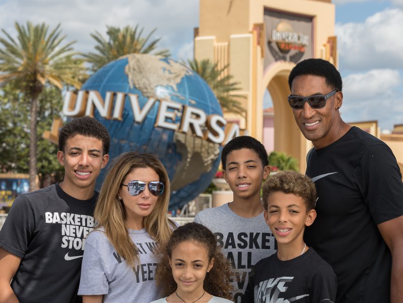 Publicity photo of Larsa Pippen, Scottie Pippen and kids by the Globe and Universal Arches
