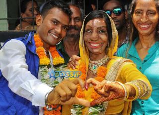 MUMBAI, INDIA - MAY 23: Acid attack victim Lalita Ben Bansi marries with Ravi Shankar at Thane Registration office, on May 23, 2017 in Thane, India. In 2012, Lalita Ben Bansi was attacked with acid by her cousin, who threw it on her over a minor argument. 5 years and 17 surgeries later, she tied the knot with 27-year-old Ravi Shankar. Shankar works as a CCTV operator at a private firm in Kandivali and owns a petrol pump in Ranchi. We will decide whether to settle in Mumbai or Ranchi depending on what Lalita wants, says Shankar. (Photo by Praful Gangurde/Hindustan Times via Getty Images)