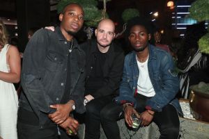 Tunde Balogun, Joie Manda Exec VP of Interscope Geffen A&M Records, and Justice Baiden attend IGA X BET Awards Party 2017 on June 24, 2017 in West Hollywood, California.